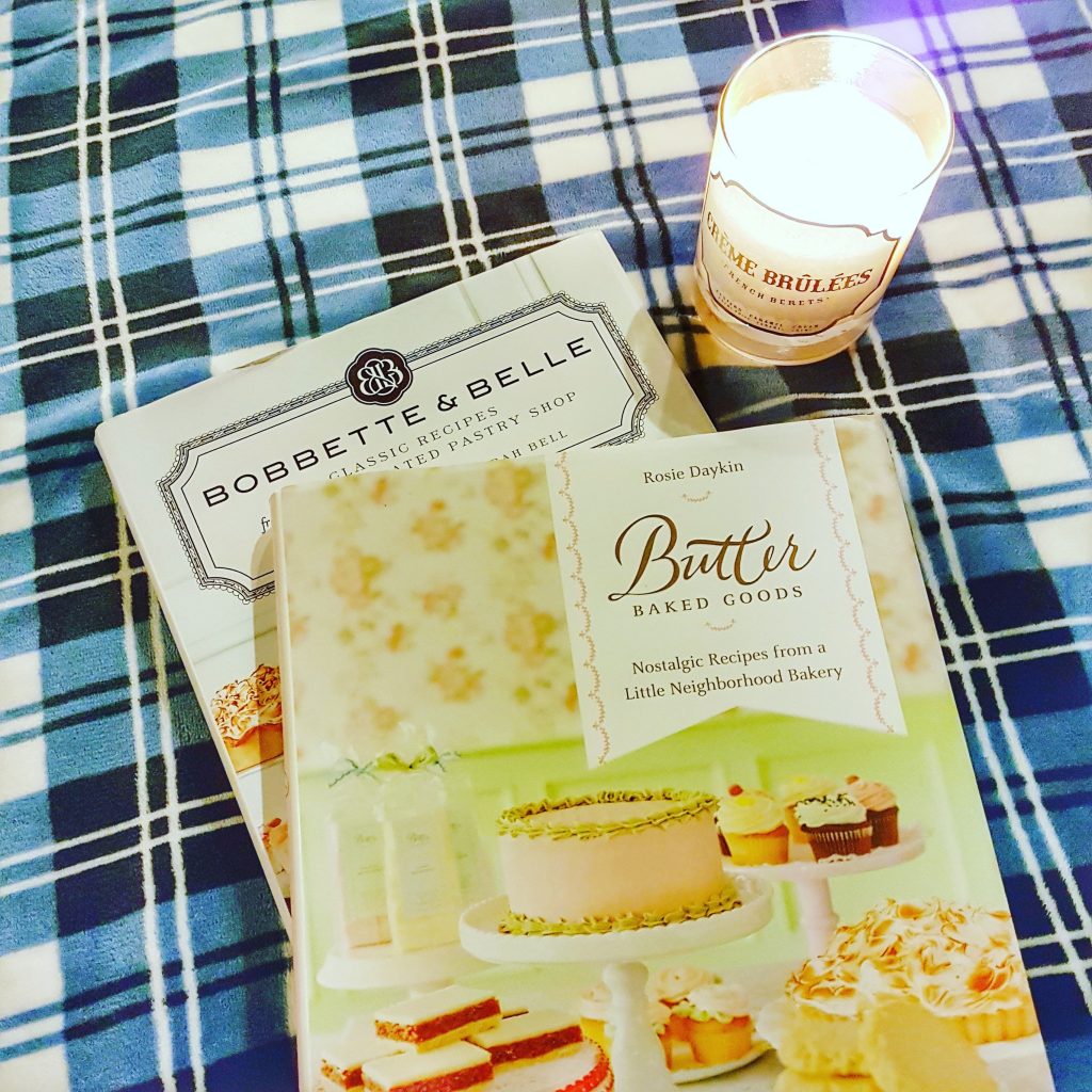 Coal and Canary Candle with baking cookbooks