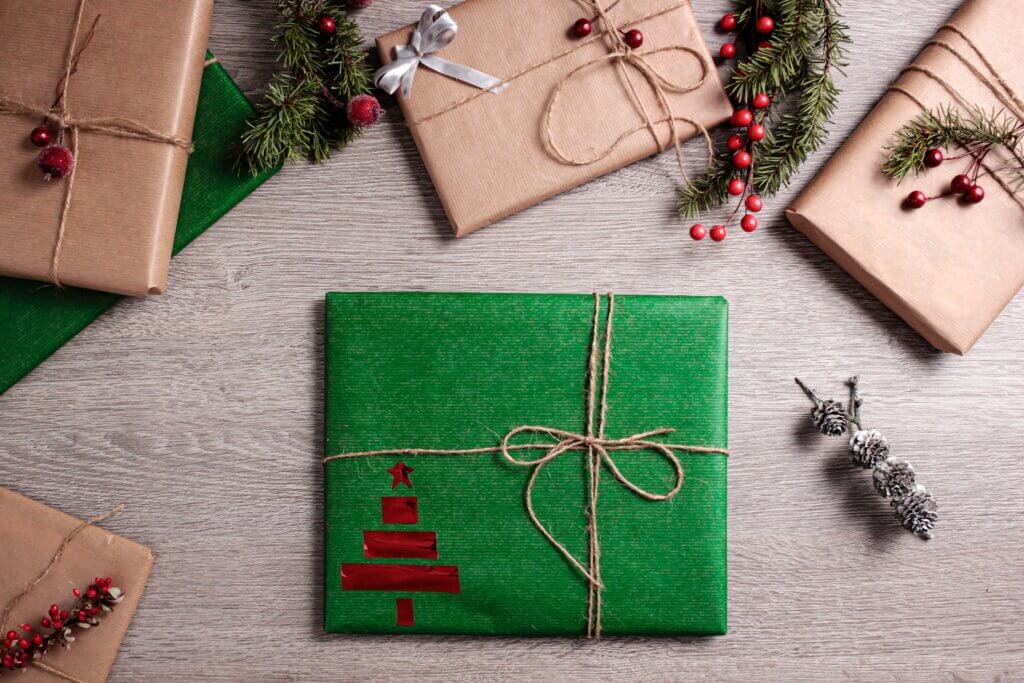 Holiday gifts wrapped with paper and string