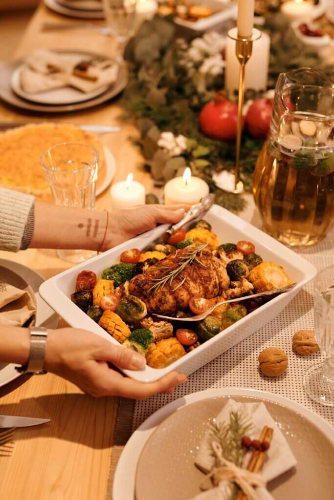 Christmas dinner of roast and potatoes being served