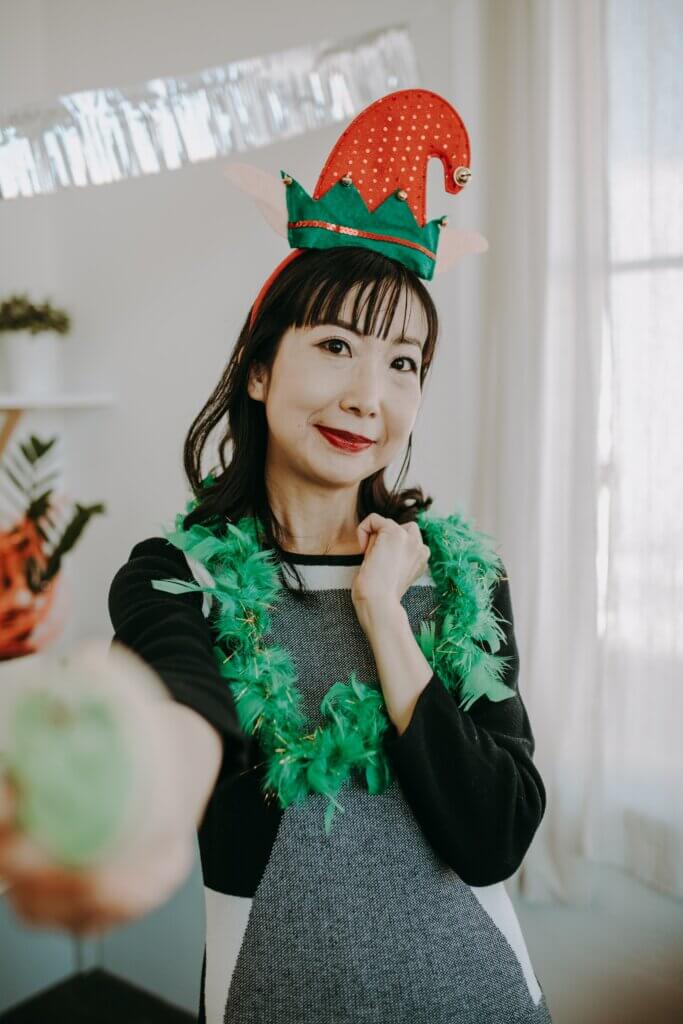 Elf hat and sweater at holiday party