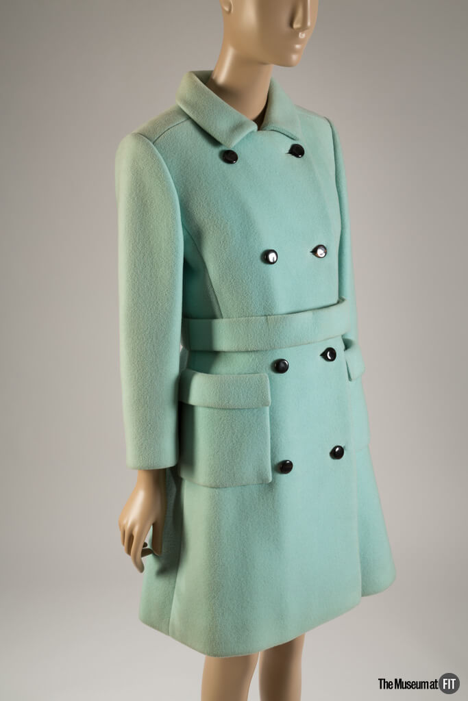 Mint green Calvin Klein coat cut in a princess-style