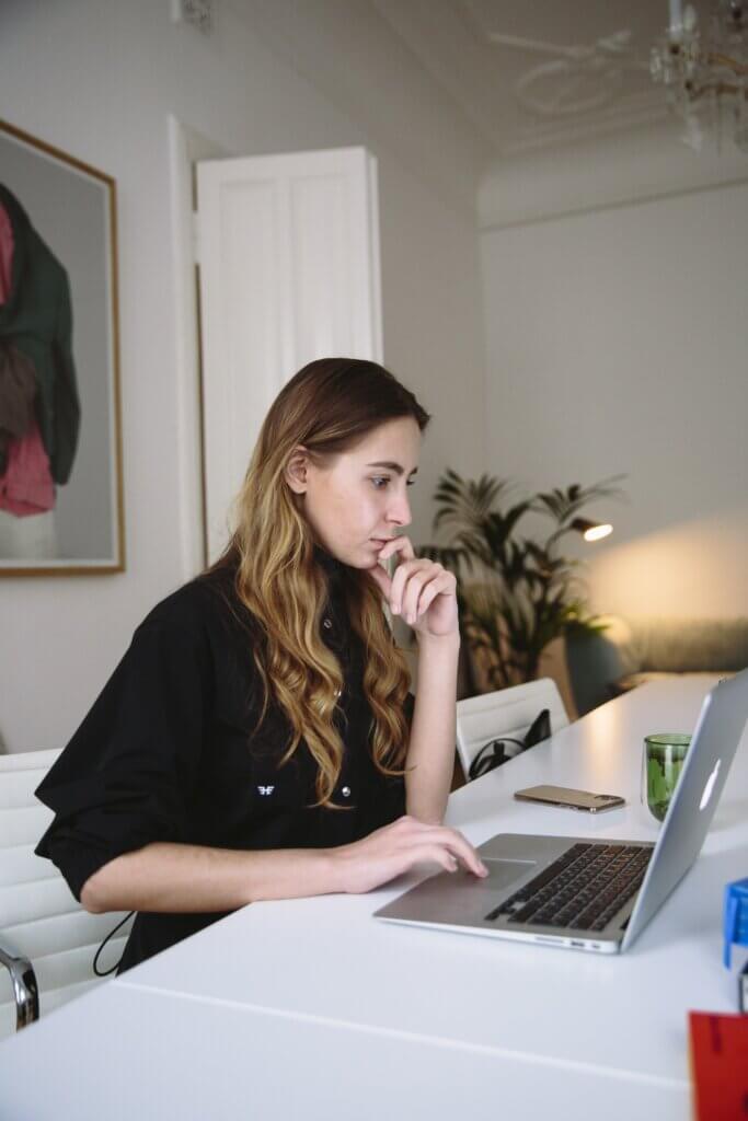 woman sitting at laptop