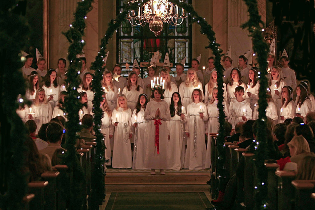Girls dressed as St. Lucia for church service
